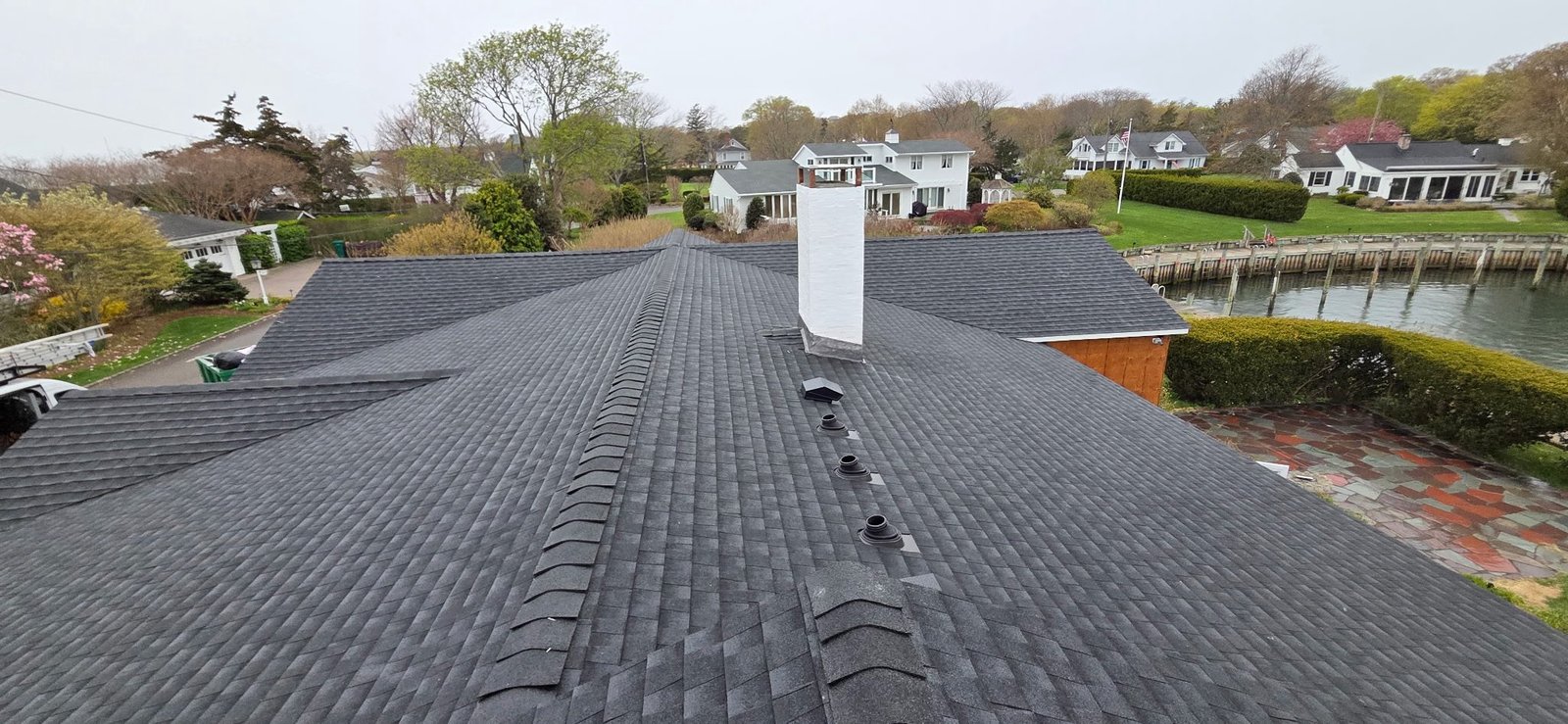 Understanding the Cost Factors of Roof Replacement in Port Jefferson, NY